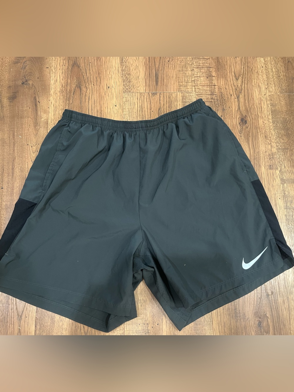 Nike men’s charcoal black Athletic Running Shorts.